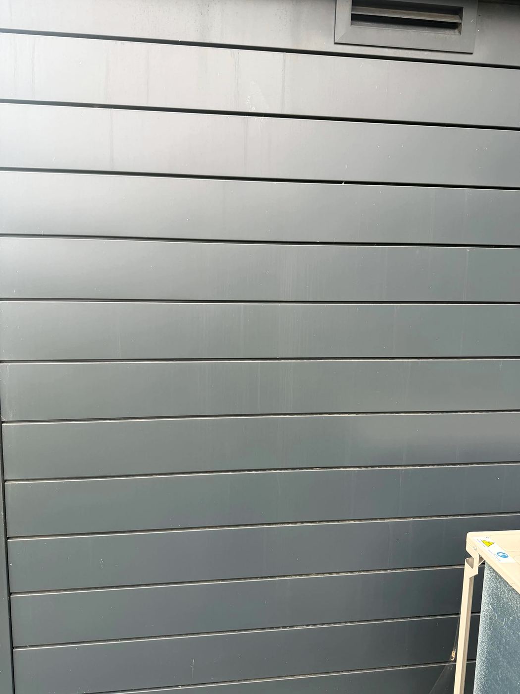 The same cladding after the bird fouling was cleaned off