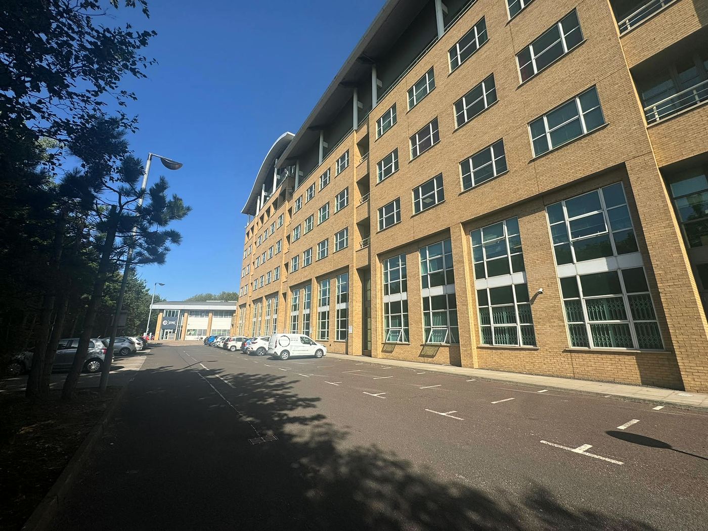 PropertyKleen van outside a six-storey office building