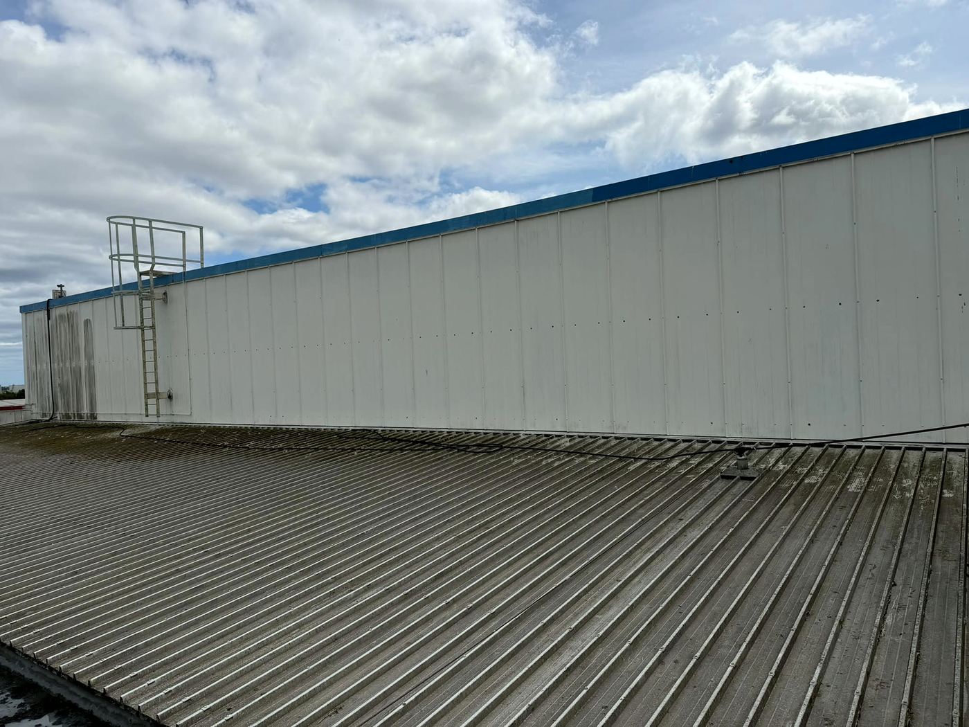 Long run of rooftop cladding after cleaning